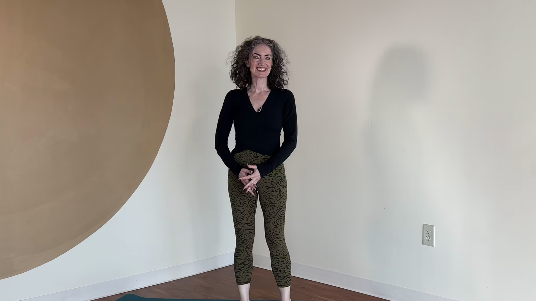 Sage Rountree demonstrating a standing balance pose sequence